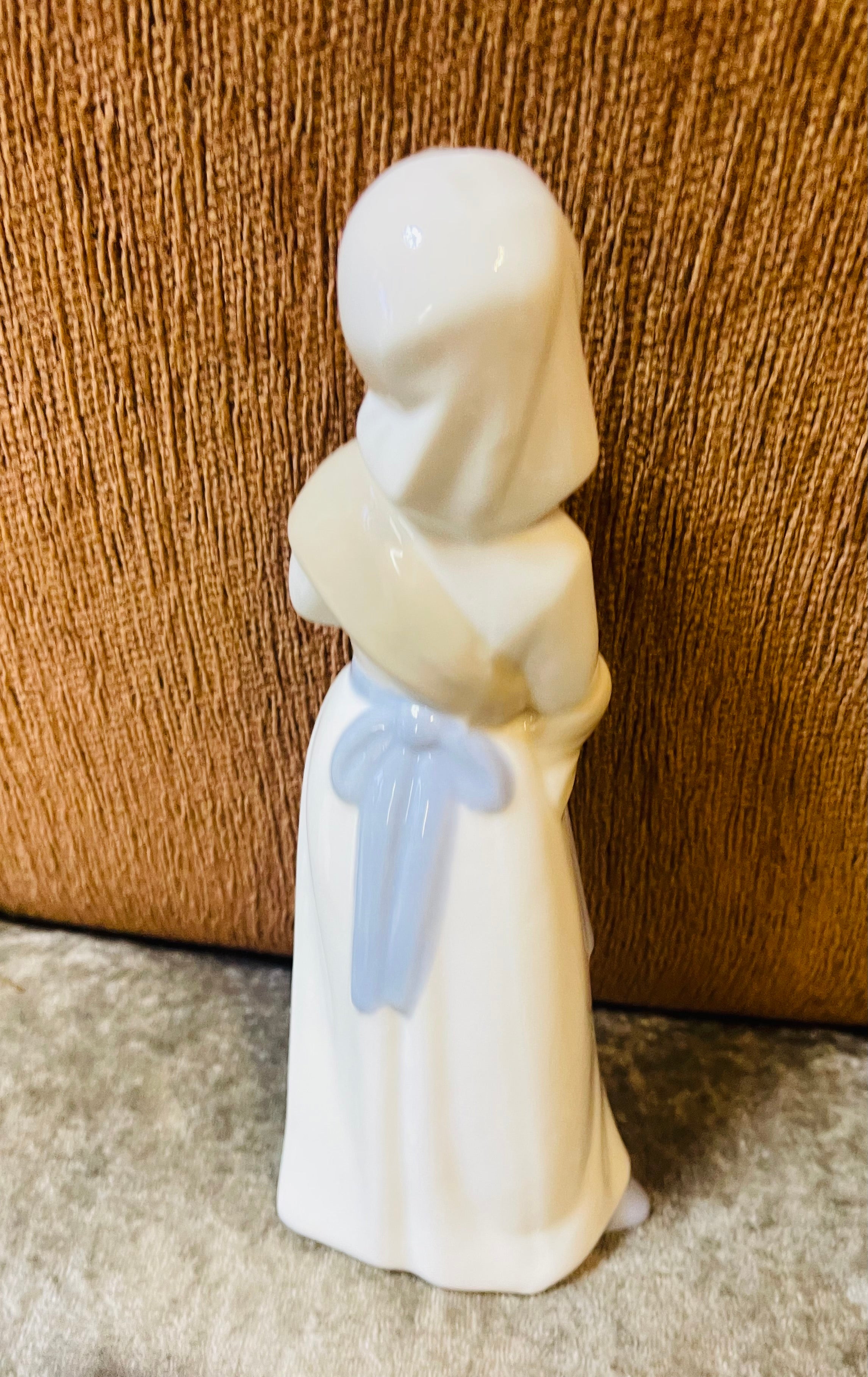 Women with baby goat