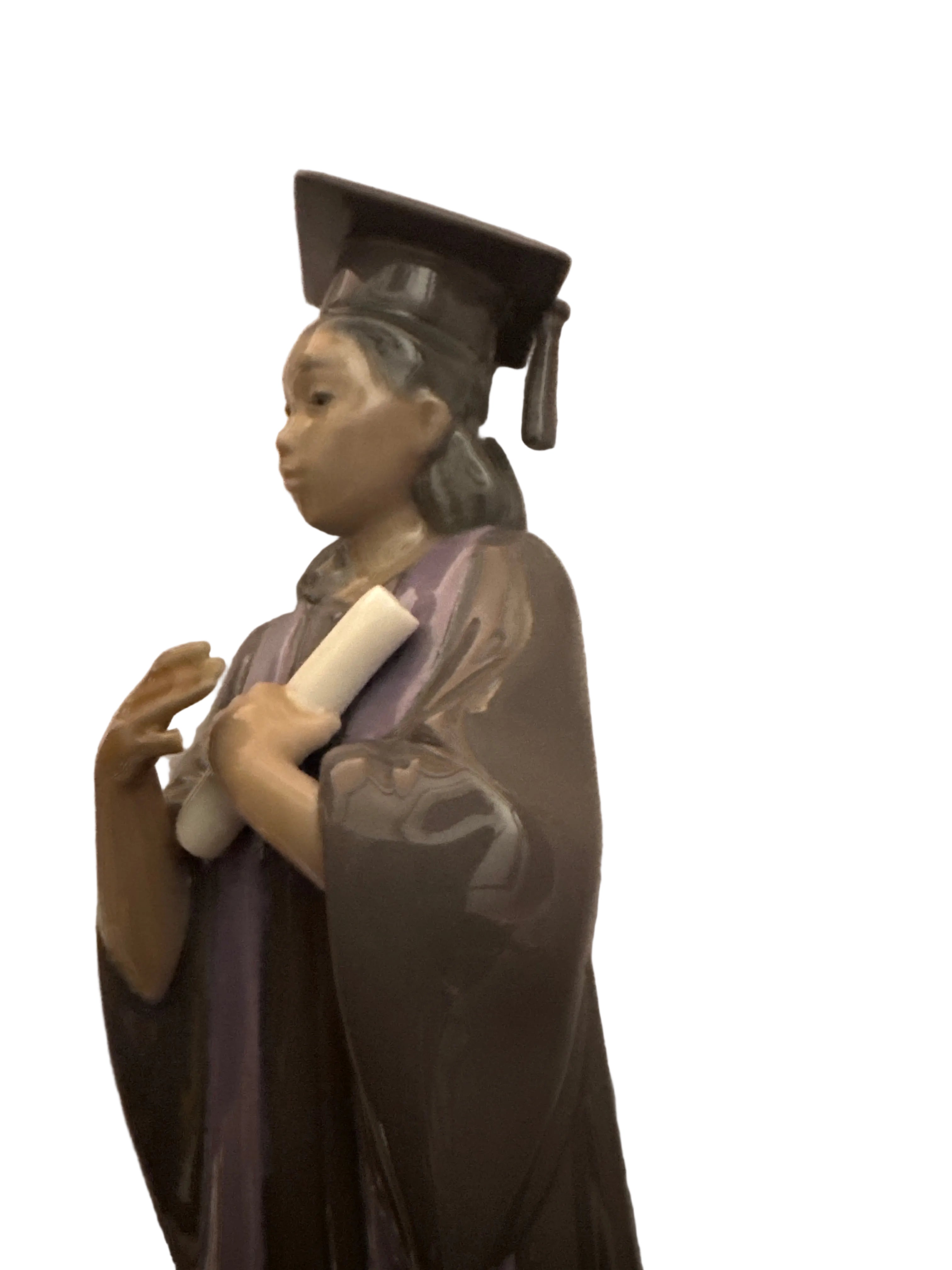 NAO Graduation joy 02001636 Lladro (there’s a minor unseen damage clearance item)