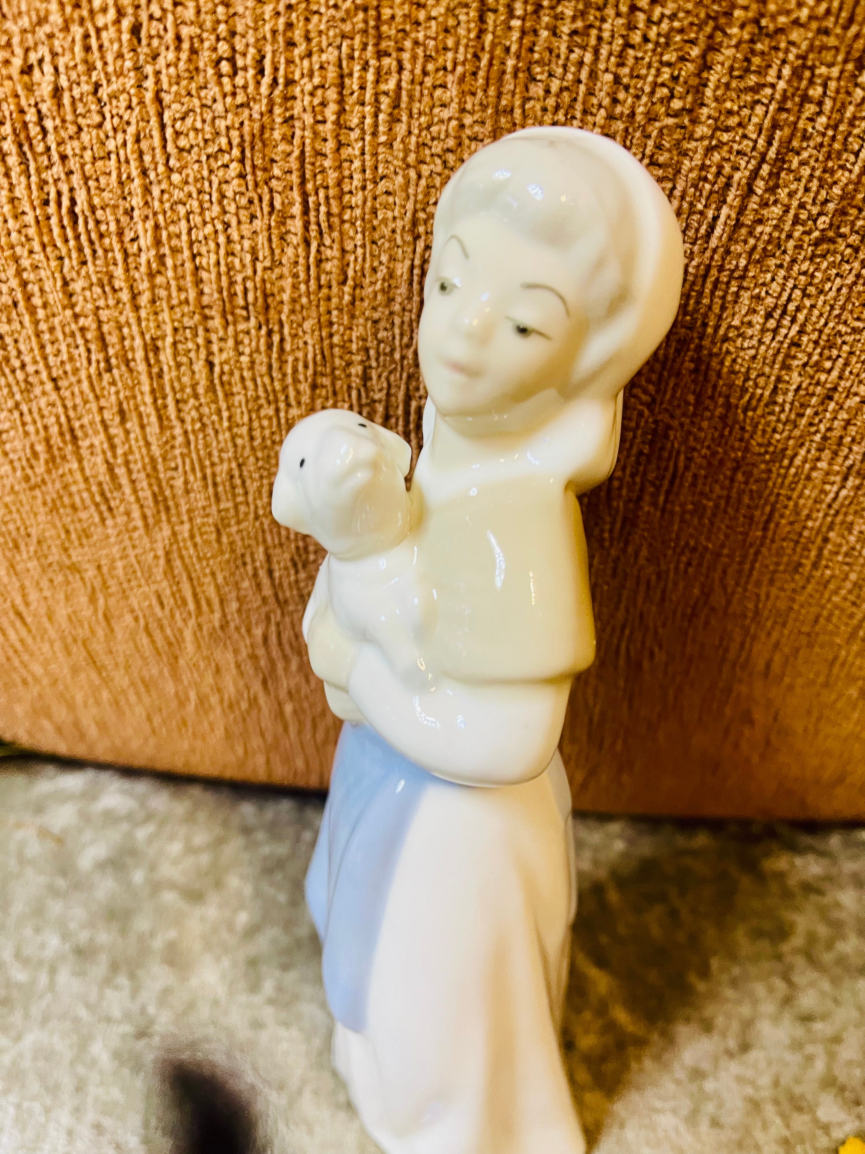 Women with baby goat