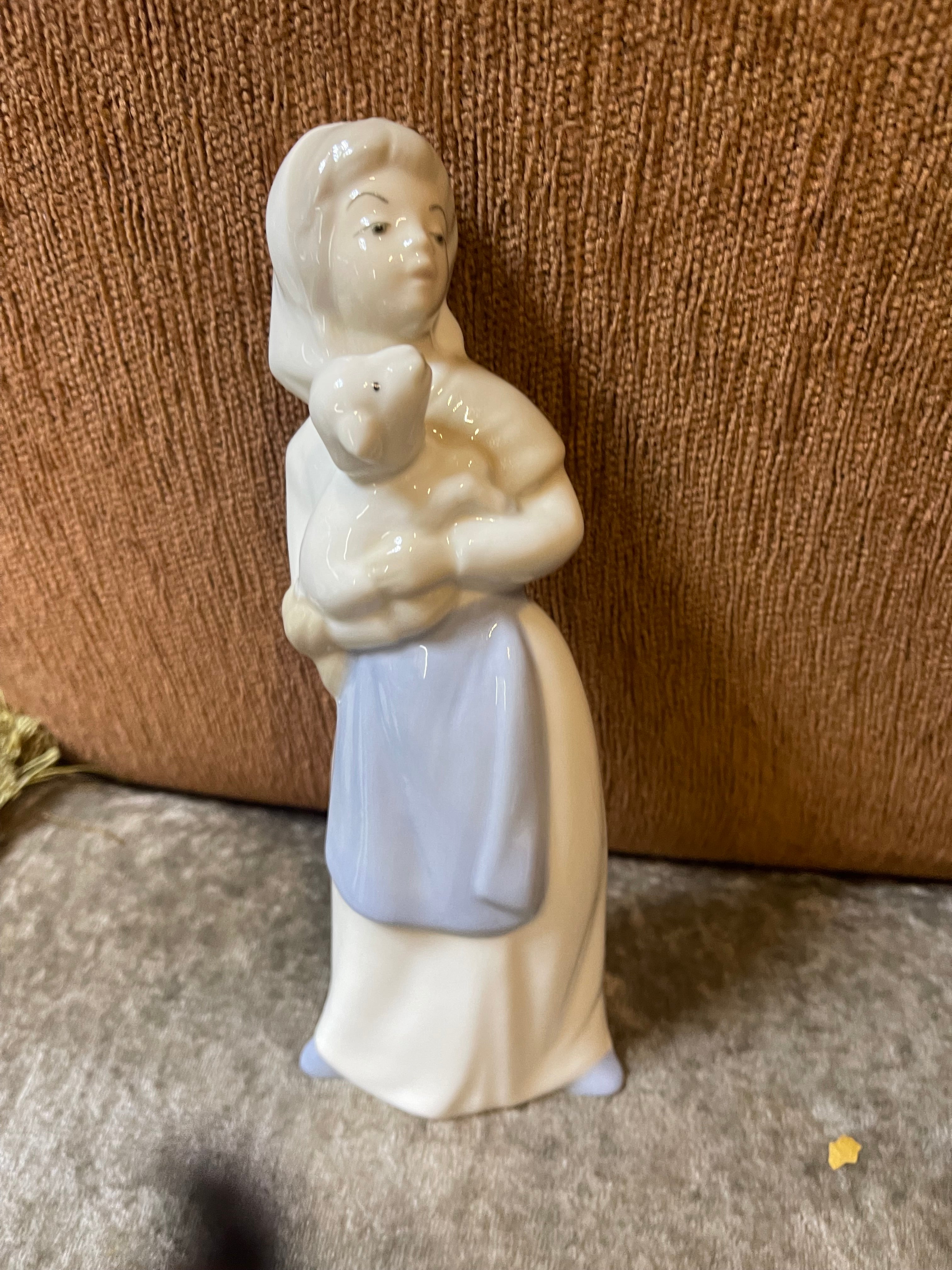 Women with baby goat