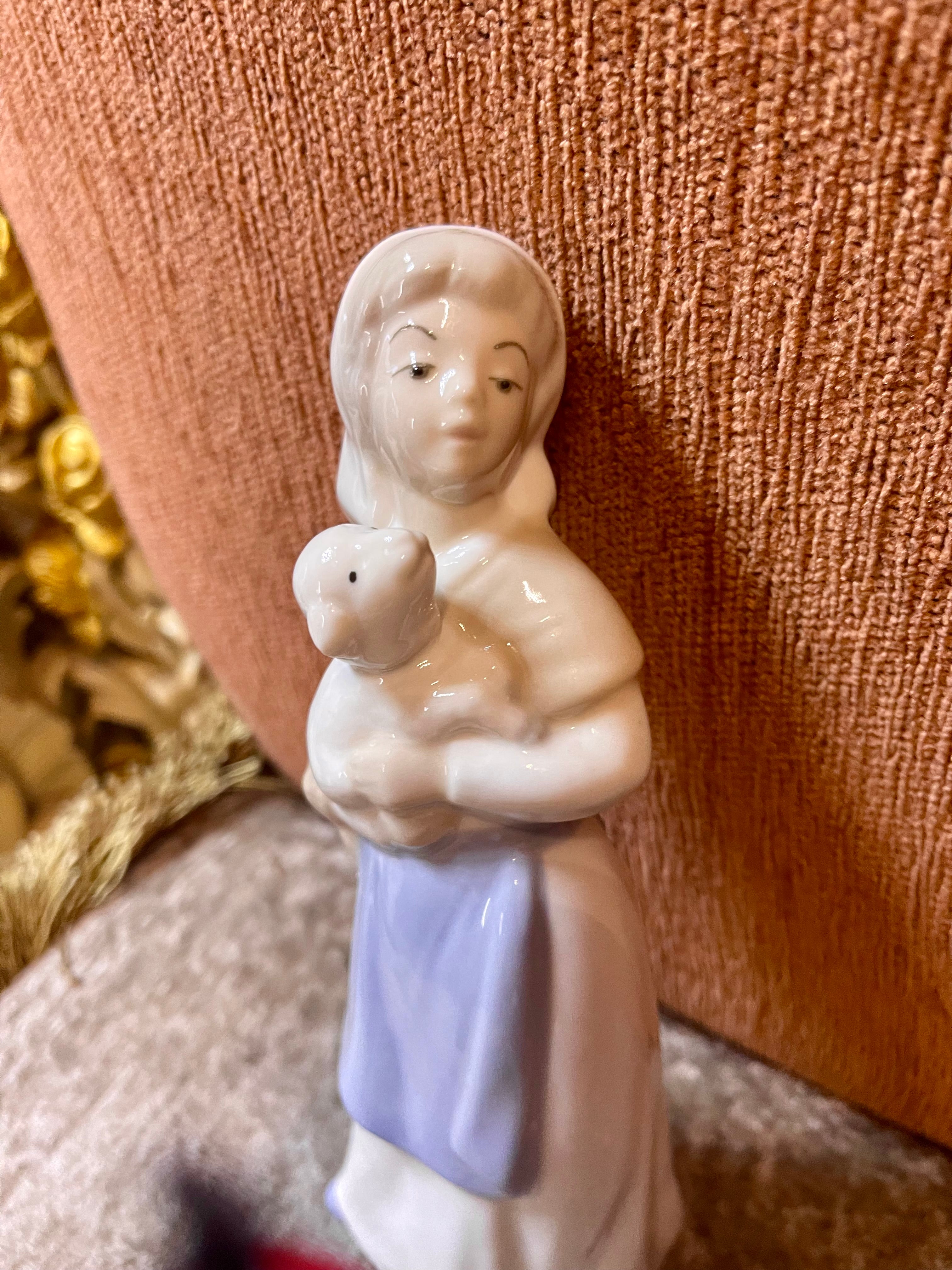 Women with baby goat